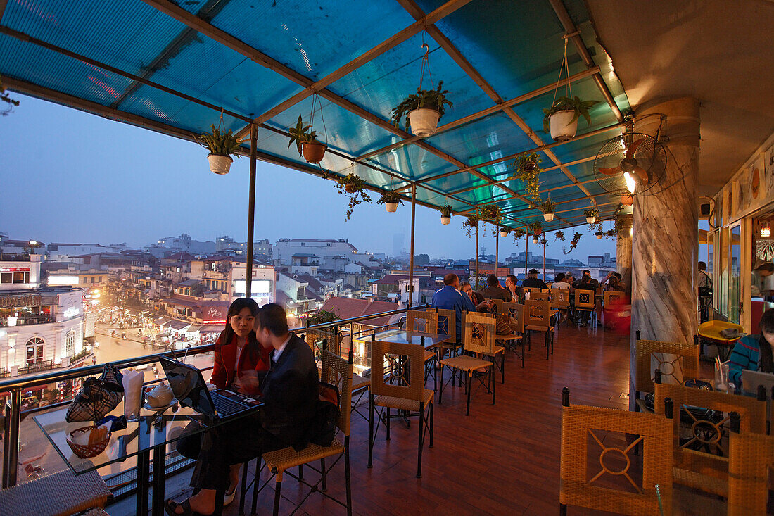 Terrace cafe with a view over the city in the evening, Hanoi, Bac Bo, Vietnam