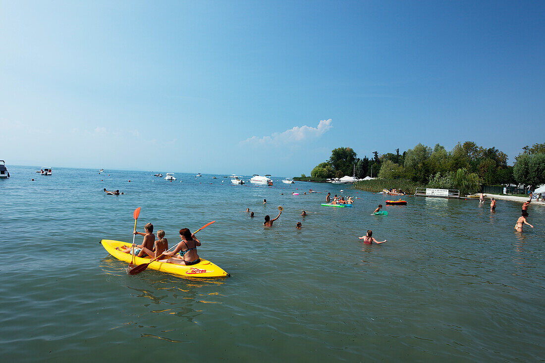 People swimming, Lazise, Lake Garda, Veneto, Italy