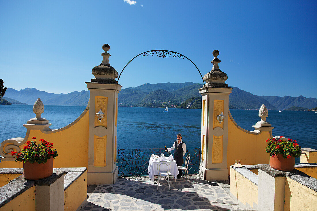 Outdoor, Staff lays the table, Hotel Royal Victoria, Varenna, Lake Como, Lombardy, Italy