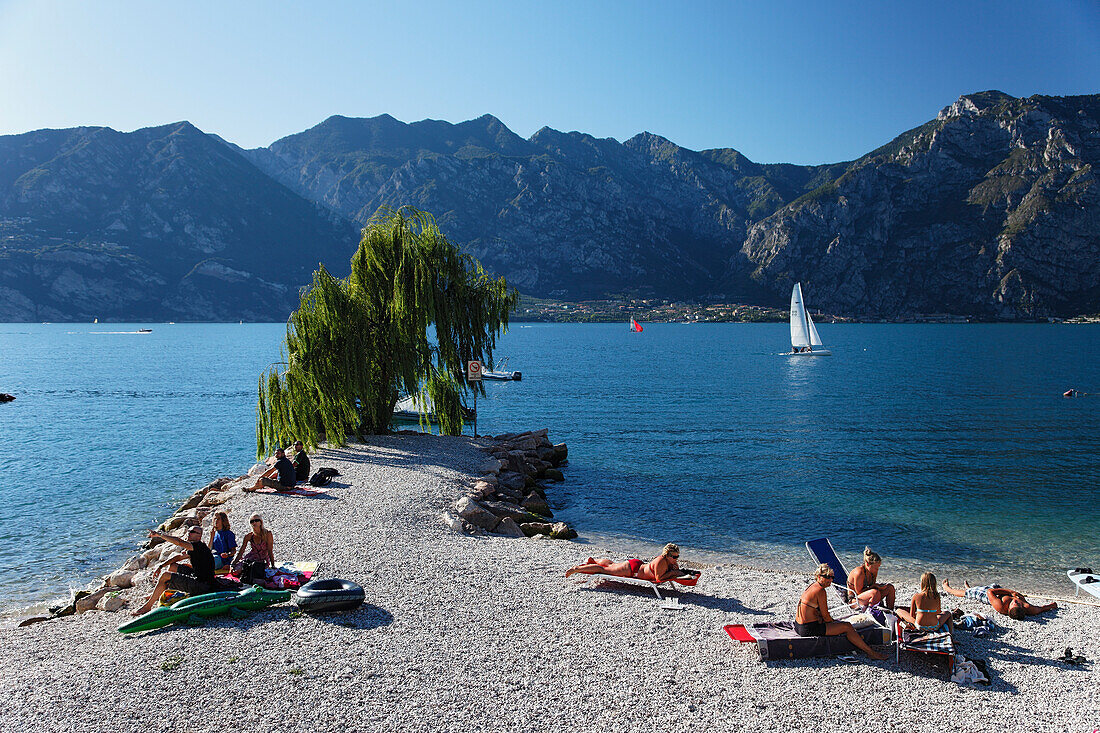 People on the beach, Lake Garda, Veneto, Italy