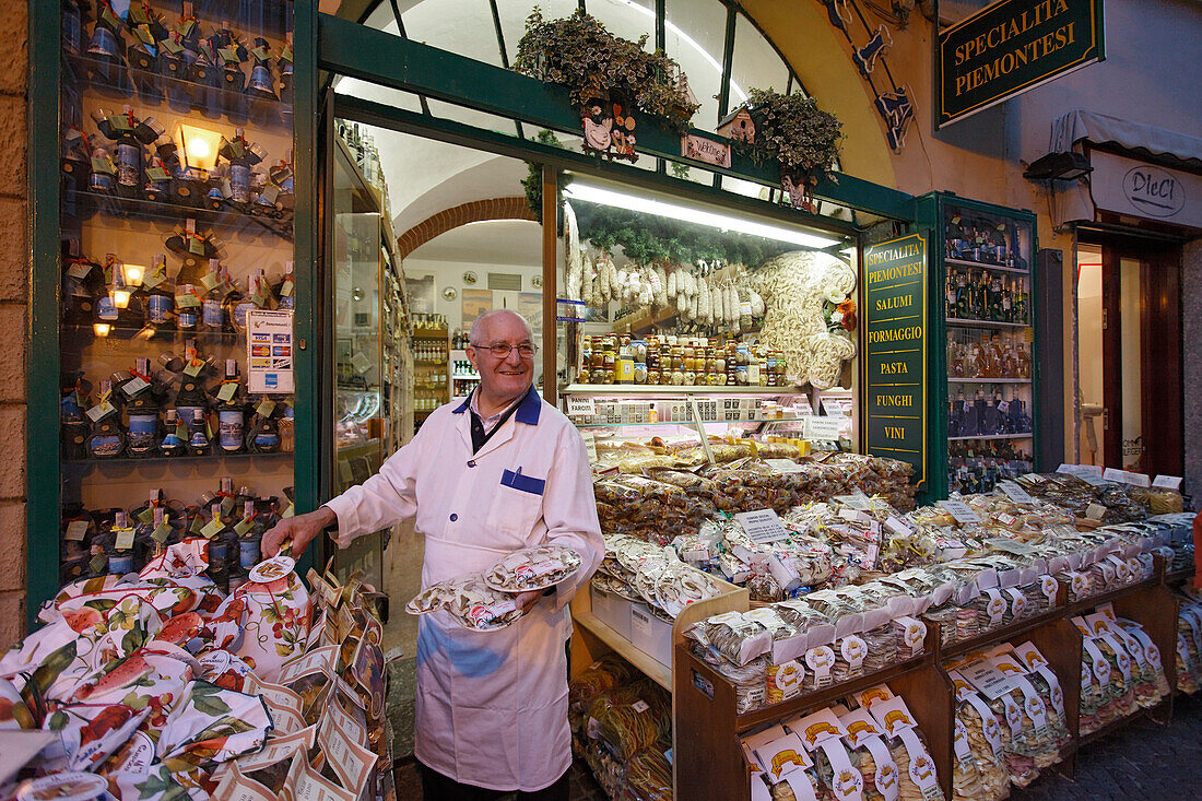 Salesman, Delicatessen Shop, Stresa, Lago Maggiore, Piedmont, Italy