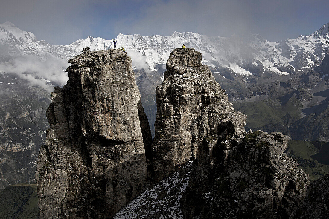 Man cheering a rock, after passig a highline, Schilthorn, Bernese Oberland, Canton of Bern, Switzerland