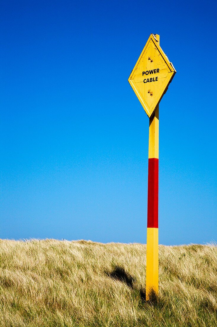 Colourful Power Cable Sign Lindisfarne Northumberland England