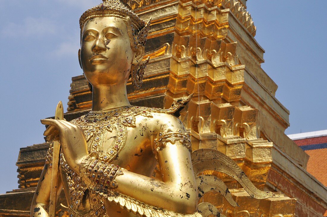 Bangkok (Thailand): a Buddhist statue at the Wat Phra Kaew