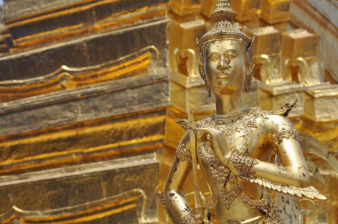 Bangkok (Thailand): a Buddhist statue at the Wat Phra Kaew