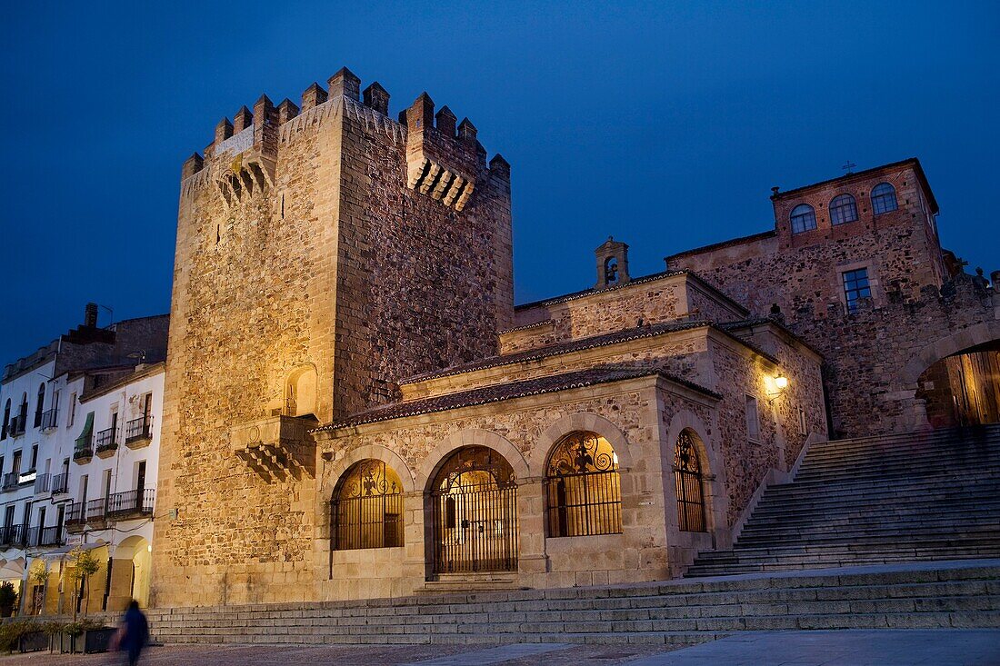 Night view of the Bujaco Tower and Ermita de la Paz in the Main Square of Cáceres City declared World Heritage by UNESCO Extremadura Spain