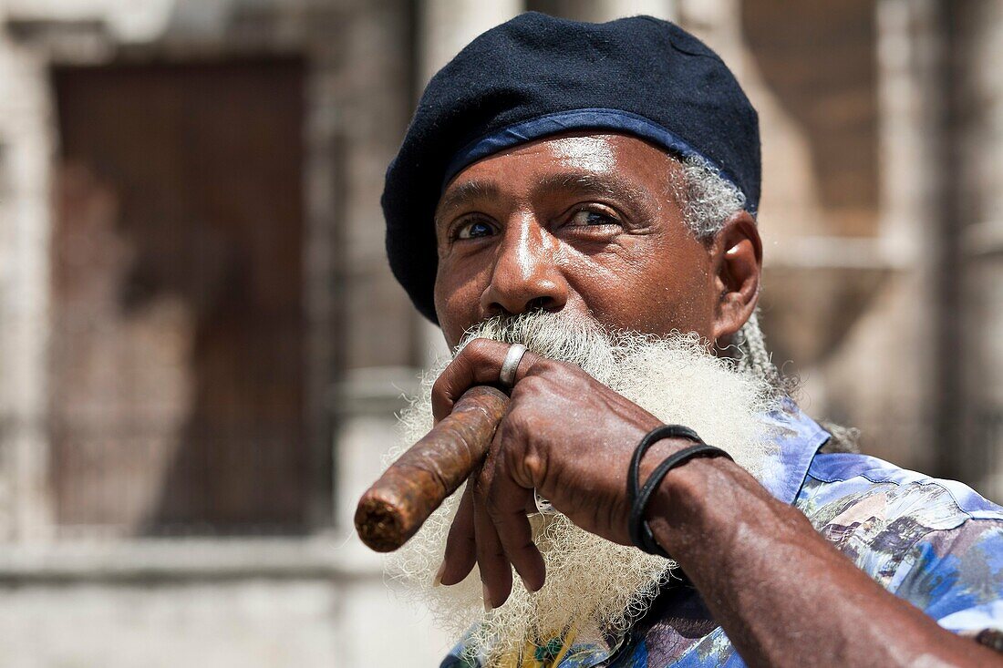 Cuba, Havana Vieja, Plaza de la Catedral, man with cigar
