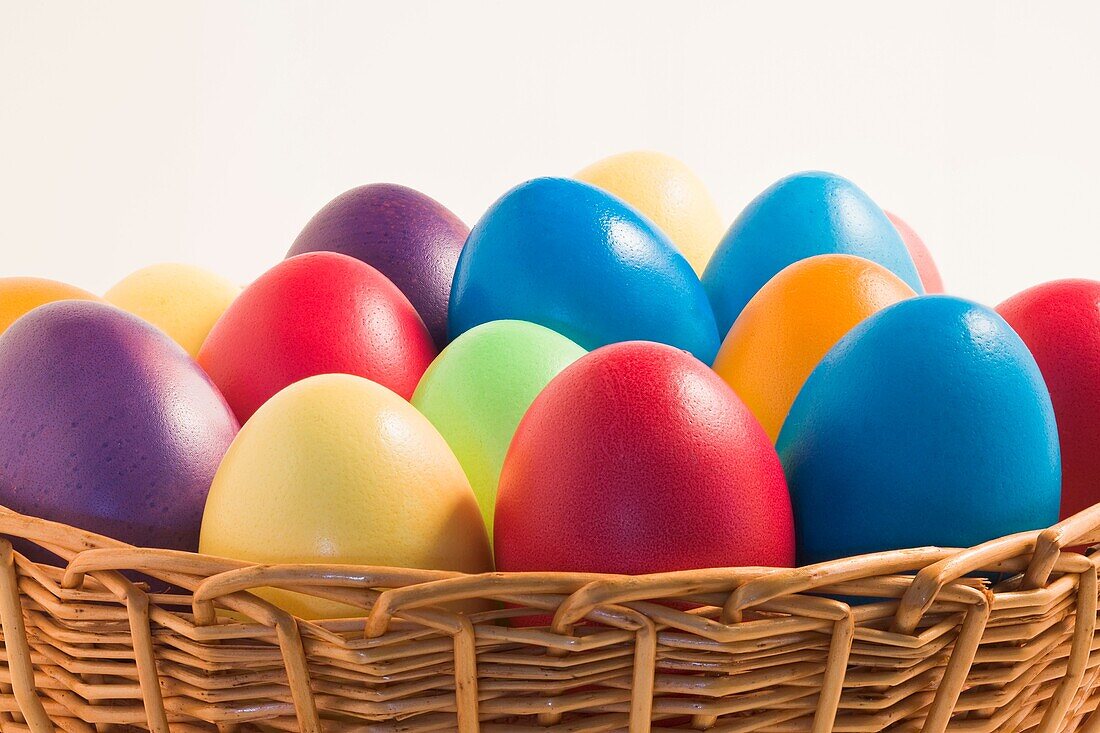 A basket full of colorful easter eggs