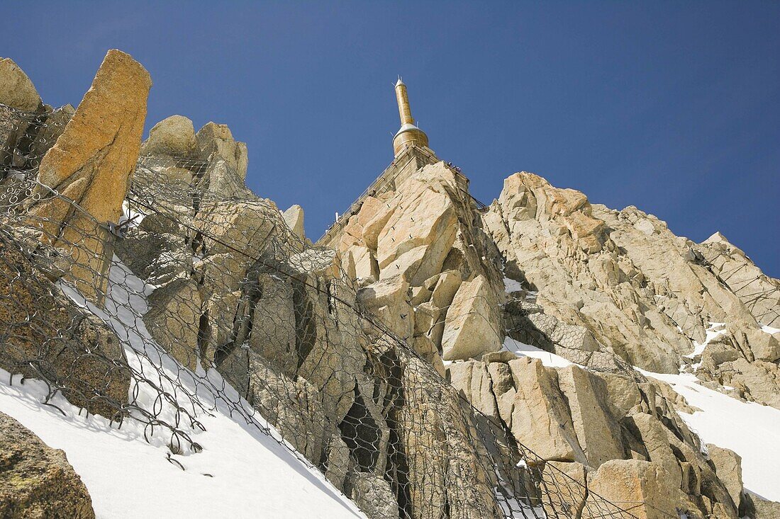 Summit tower at the top of the Aiguille Du Mid. Chamonix. Mont Blanc Massif. France.