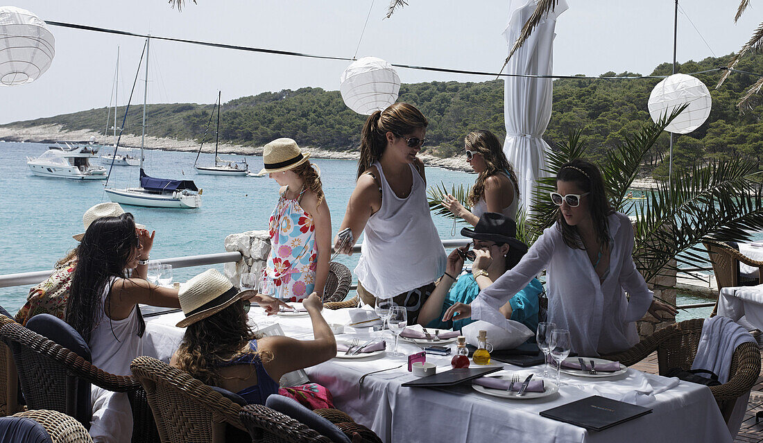 Women in a restaurant, Palmizana, Paklinski Islands, Hvar, Split-Dalmatia, Croatia