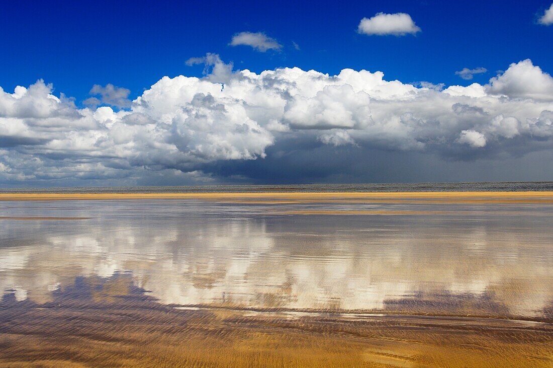Cloudscape over the mile long sands of Westward Ho! beach in England