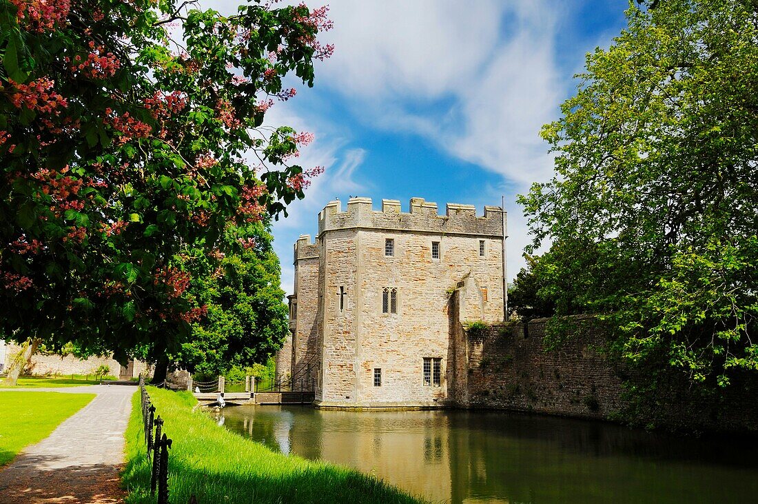 The moat and the Gatehouse to the Bishop’s Palace and gardens in the city of Wells in Somerset, England