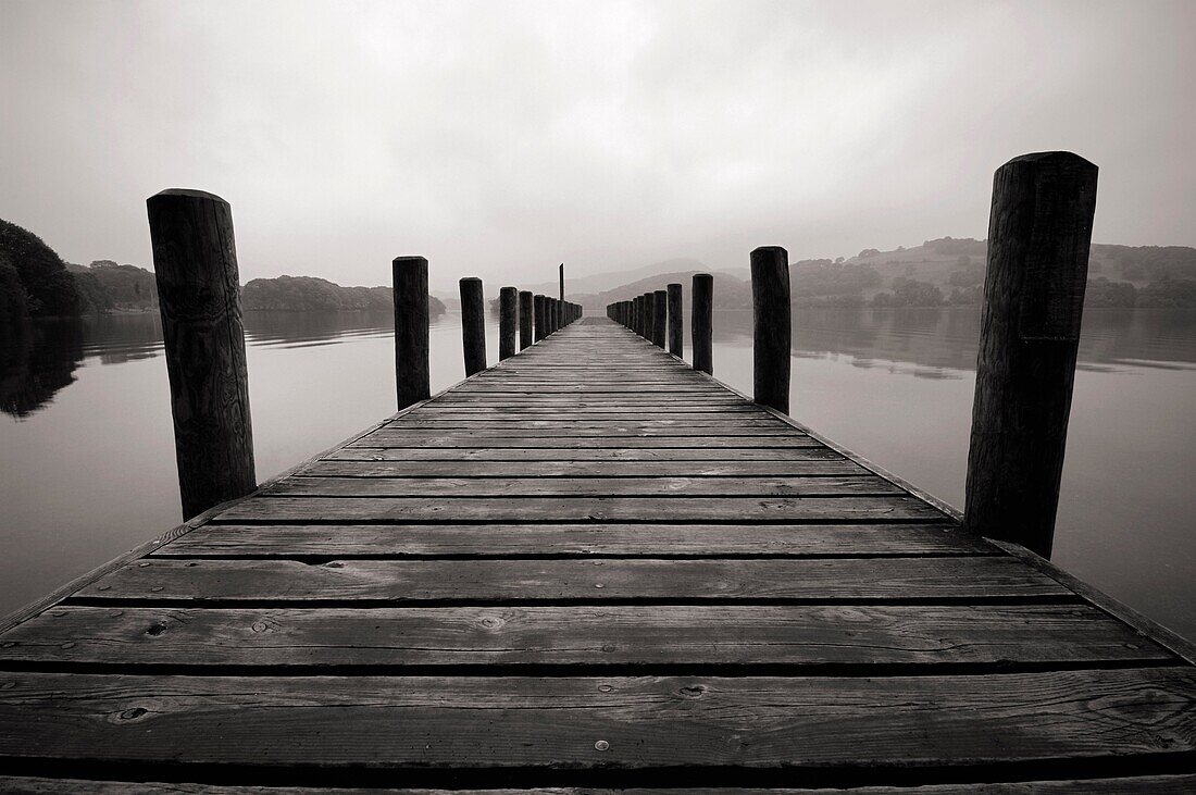 Jetty on Coniston Water in The Lake District National Park Cumbria England