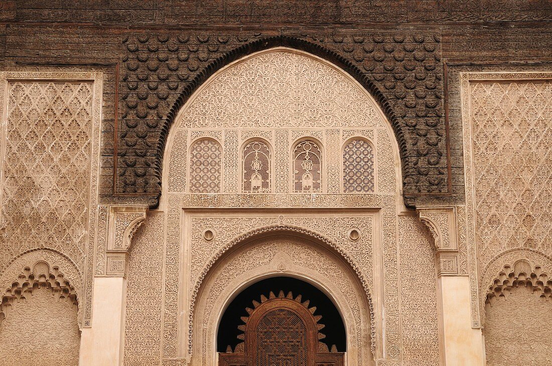 Detail of Stucco plaster work and cedarwood carving at the Ali Ben Youssef Medersa, Marrakech, Morocco, North Africa
