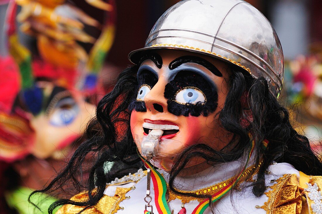 Masked dancer at the Carnaval del Pueblo Latin American Carnival, London, England, UK