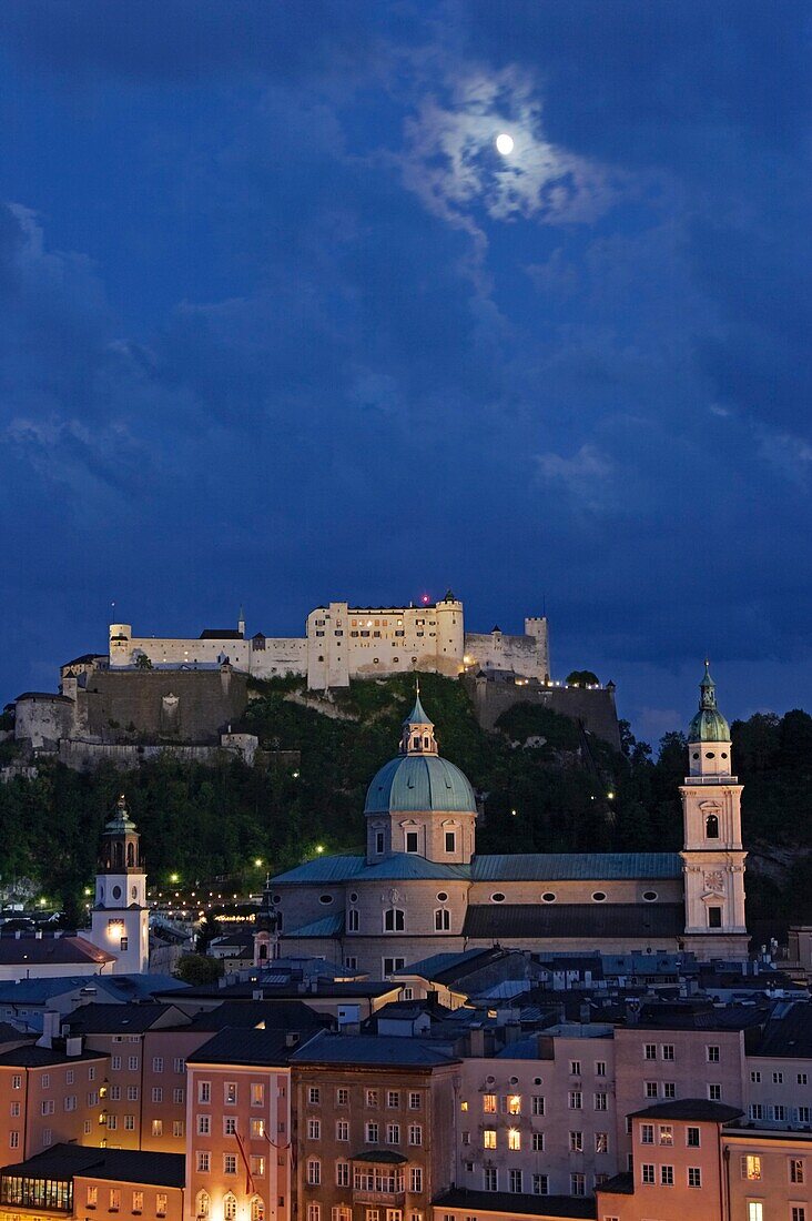 View from Kapuzinerberg mountain towards the old town of Salzburg at dusk Austria