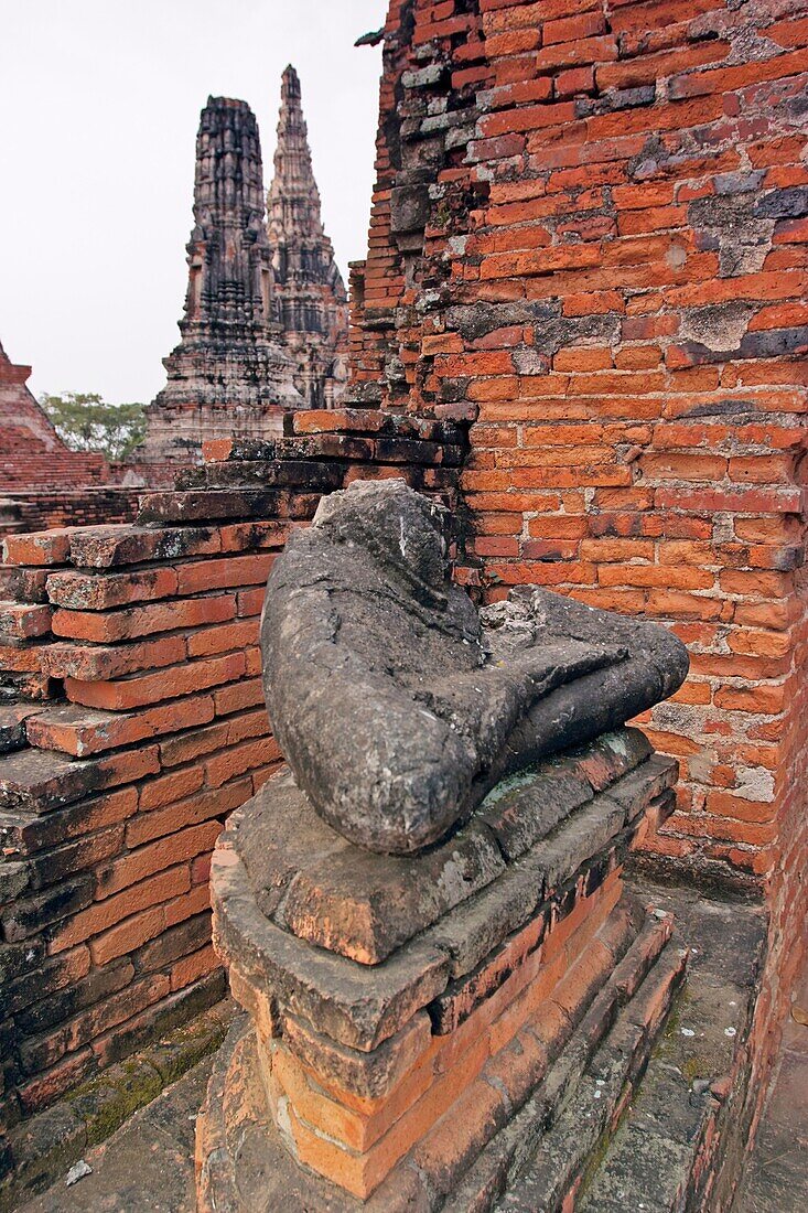 Headless Buddha figure in Wat Chai Wattanaram, ruined Buddhist temple in Ayutthaya, Thailand