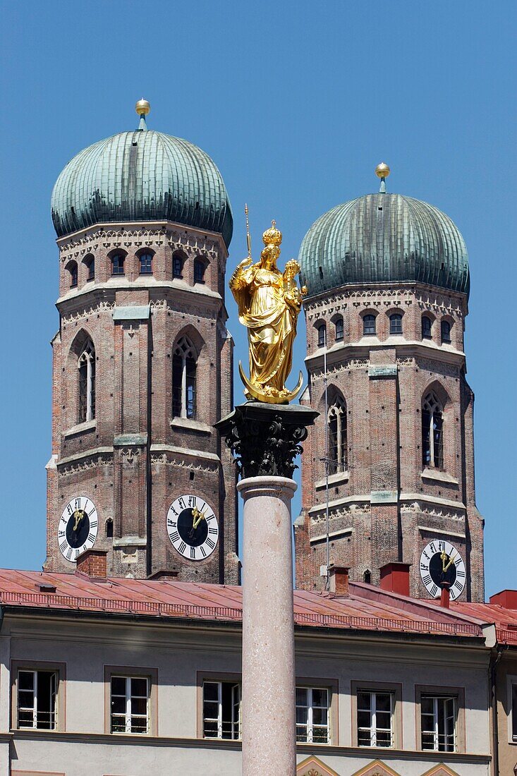 Towers of Frauenkirche and Mary’s column in the middle Munich, Bavaria, Germany