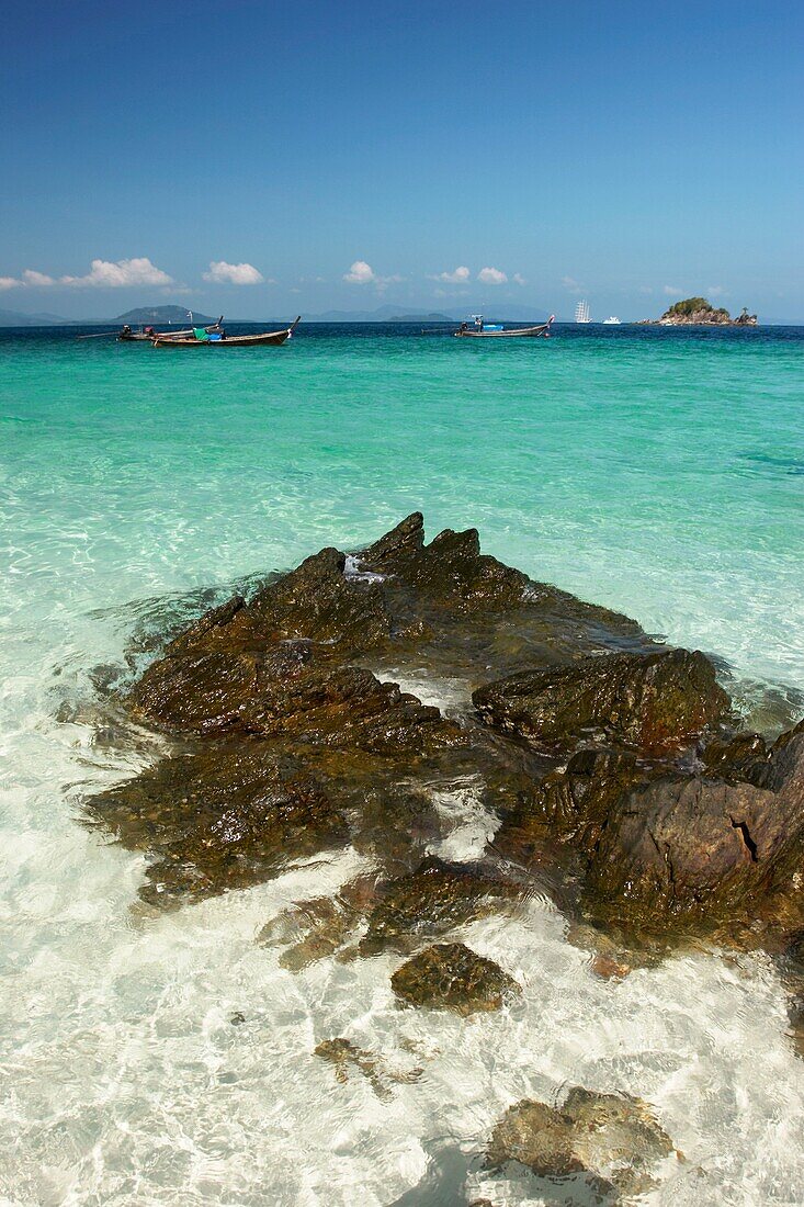 Crystal clear waters around Ko Khai, a tiny coral island near Phuket, Thailand