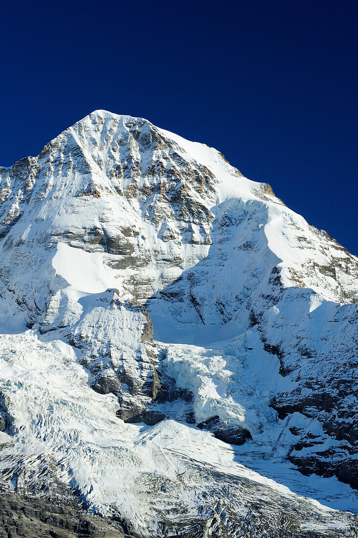 Snowy Moench under blue sky, Kleine Scheidegg, Grindelwald, UNESCO World Heritage Site Swiss Alps Jungfrau - Aletsch, Bernese Oberland, Bern, Switzerland, Europe