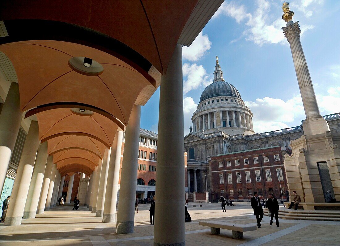Repeated arches in Paternoster Square right outside the London Stock Exchange with St Pauls Cathedral in the background Architects are Eric Parry Architects and Sheppard Robson Paternoster Square column is a Corinthian column of Portland stone topped by