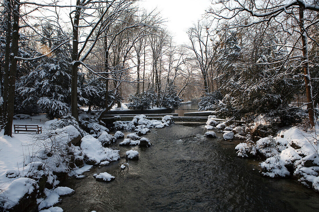 Winter scenery with river in winter, English Garden, Munich, Bavaria, Germany