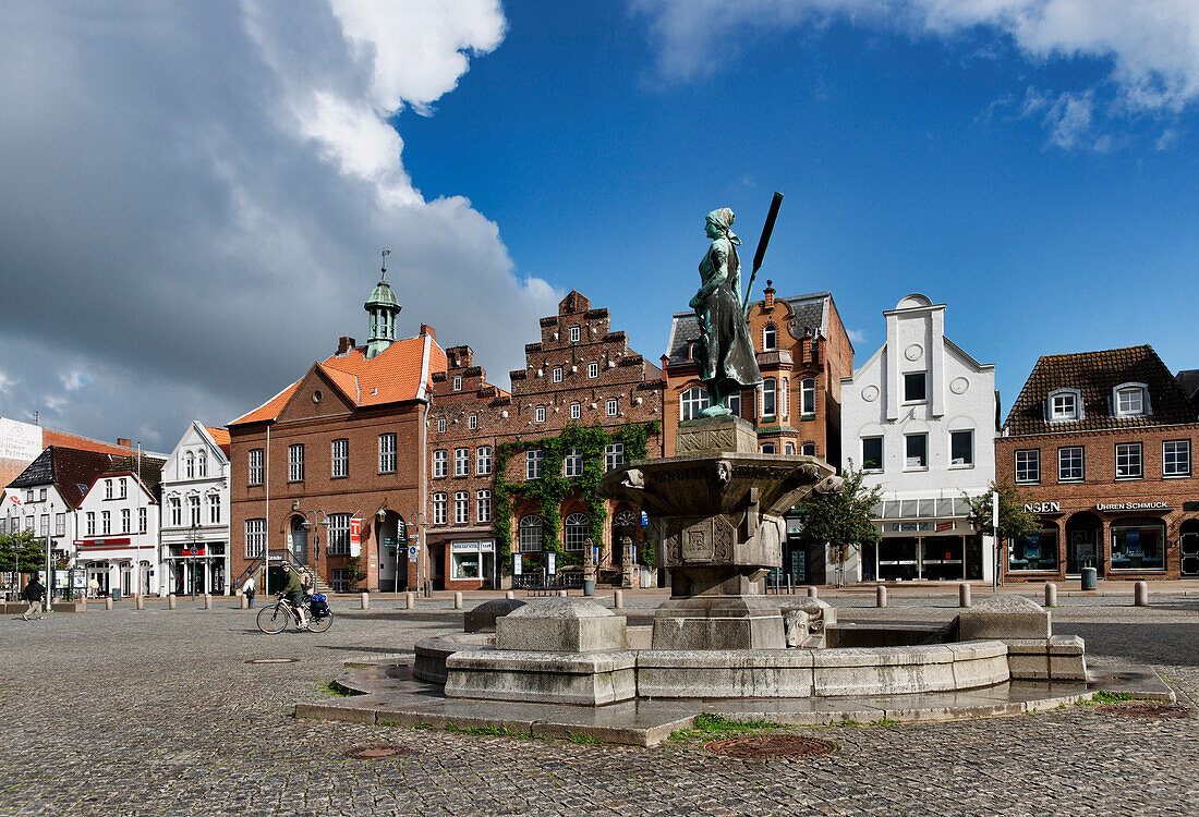 Market square with Rasmussen Woldsen Fountain, Husum, Schleswig-Holstein, Germany