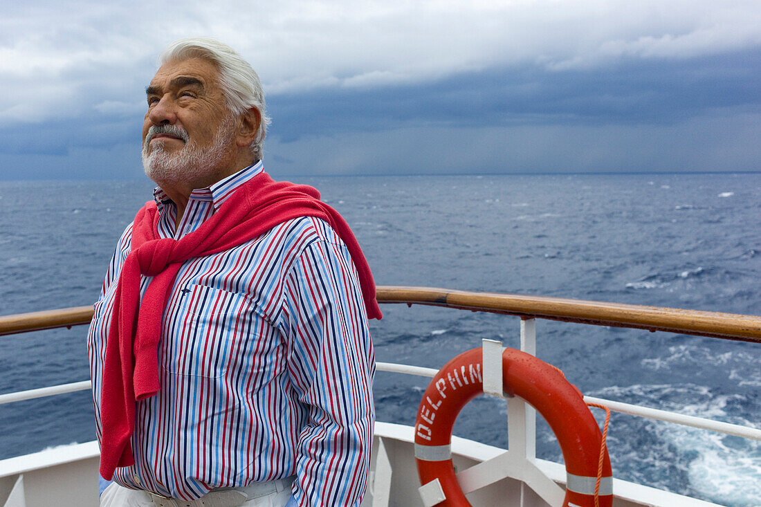 Actor Mario Adorf aboard the cruiseship MS Delphin, for the filming of the ARD film Die lange Welle hinterm Kiel, Aegean Sea, near Greece, Europe