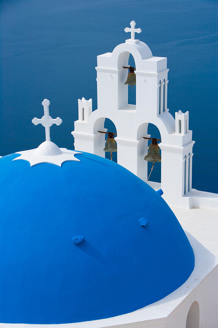 Blue dome of Greek Orthodox church &amp;amp;amp; bell tower, Fira, Santorini, Greece, Europe