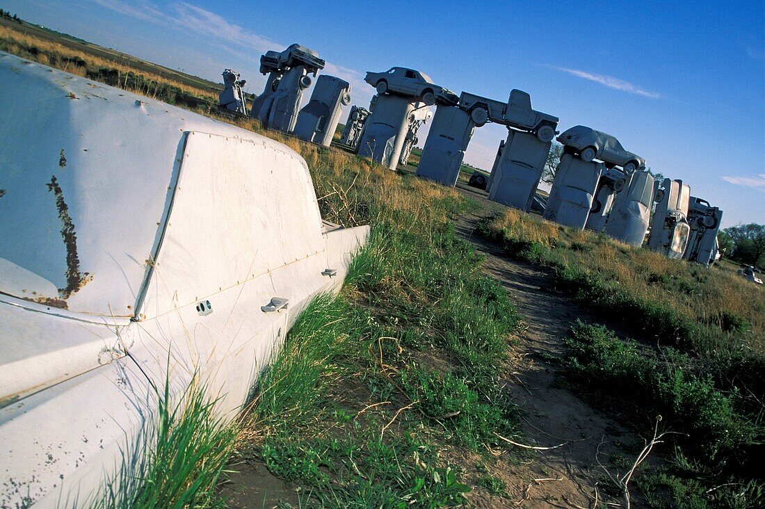 Carhenge, near Alliance, Nebraska, USA, 2004  Carhenge is a replica of England's Stonehenge located near the city of Alliance, Nebraska on the High Plains Instead of being made from stones, Carhenge is constructed of vintage American automobiles, all c