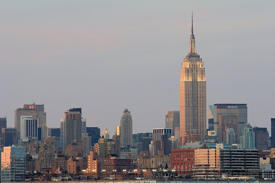 Part of the New York skyline at dusk This is an HDR photo Empire State Building at right
