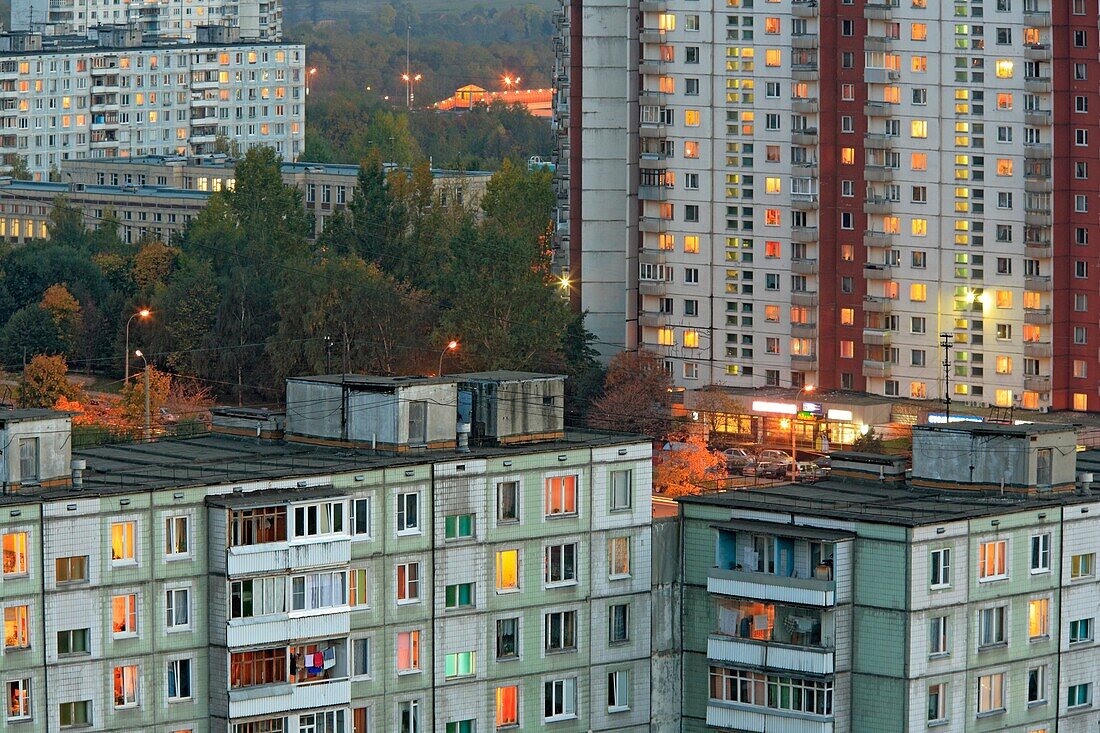 Apartment buildings in the evening with lights in windows, Moscow, Russia