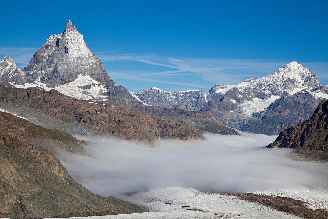 View over Gorner Glacier with early morning fog to Matterhorn, Zermatt, Canton of Valais, Switzerland, myclimate audio trail