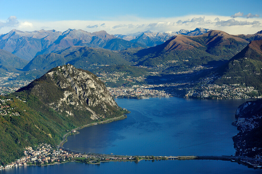 Lake Lugano, Monte San Salvatore and Lugano with Ticino range in background, Monte San Giorgio, UNESCO World Heritage Site Monte San Giorgio, lake Lugano, Ticino range, Ticino, Switzerland, Europe