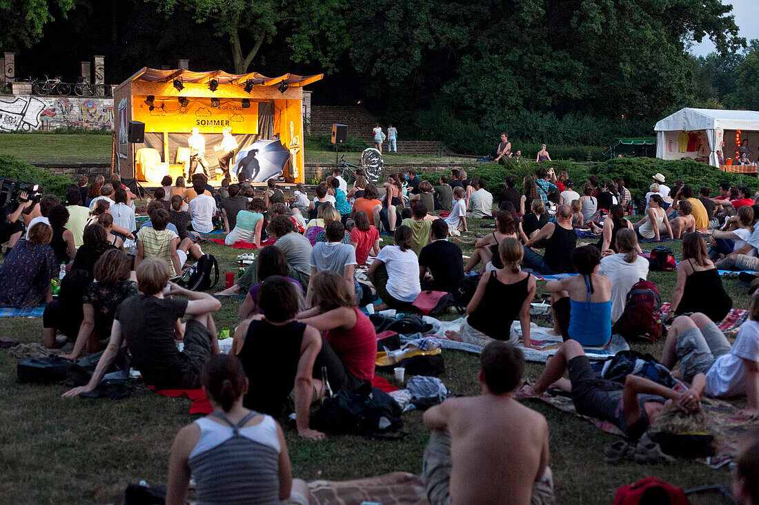 Audience on meadow, Leipzig Radio Drama Summer Festival, Leipzig, Saxony, Germany