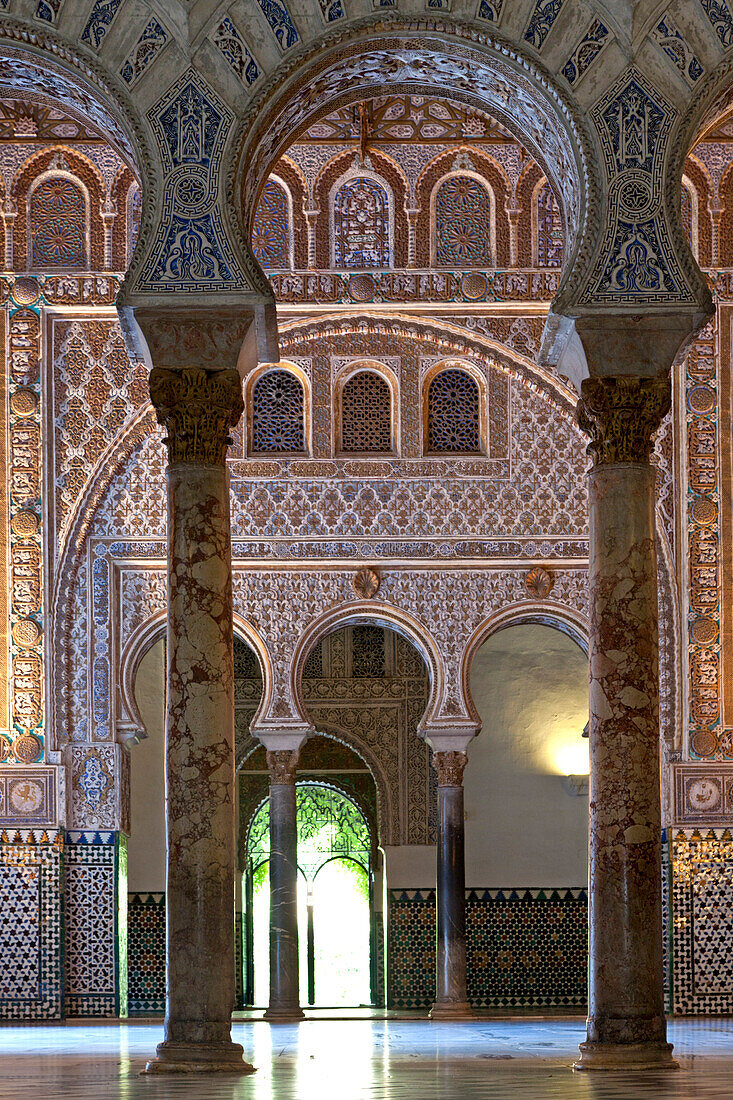 Inside the Alcázar of Seville, royal palace originally a Moorish fort, Seville, Spain