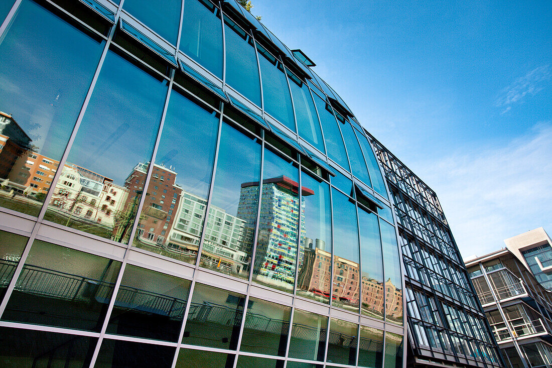 Reflection on glass facade, Media Harbour, Düsseldorf, Duesseldorf, North Rhine-Westphalia, Germany, Europe