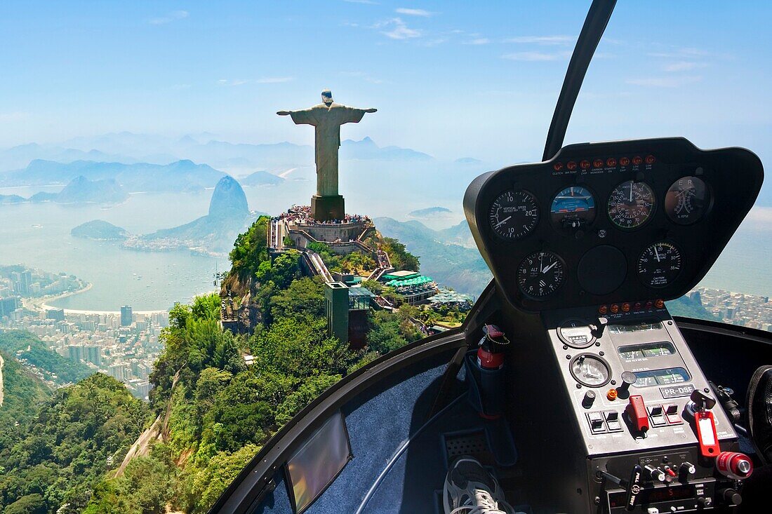 Aerial view from the inside of a helicopter of the Christ the Redeemer statue in Rio de Janeiro Brazil