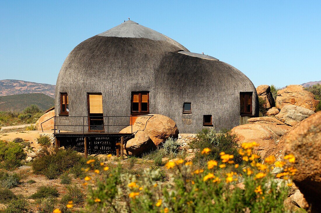 Namakwa Mountain Suite, oversized thatched, dome-shaped accommodation resembling the traditional huts of the local Nama tribe, Naries Namakwa Retreat, Naries, South Africa