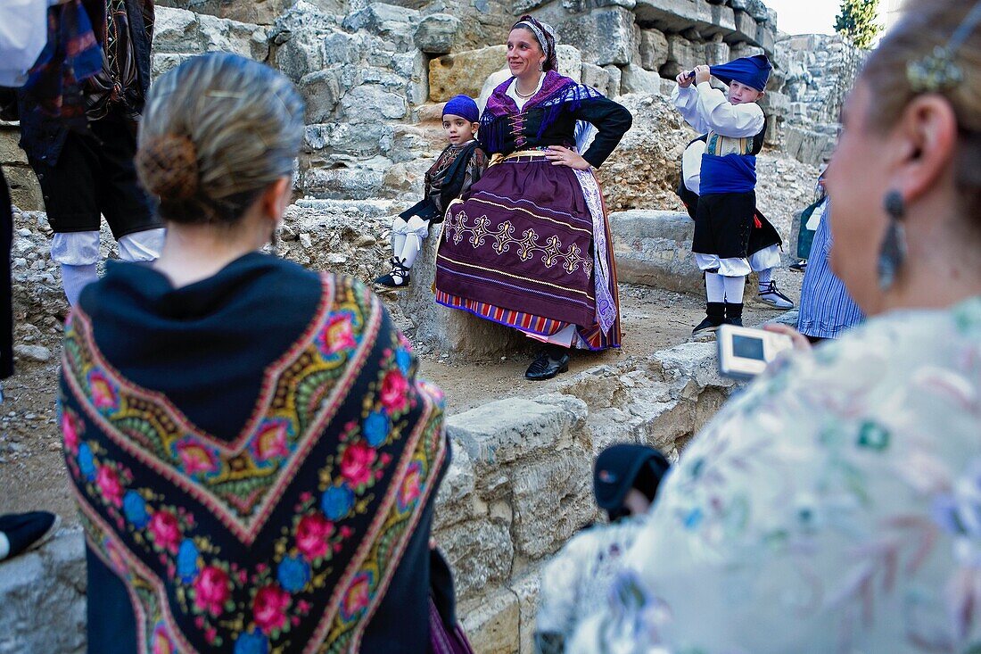 Zaragoza, Aragón, Spain: People with traditional costume on October 12 during the celebration of El Pilar in roman wall