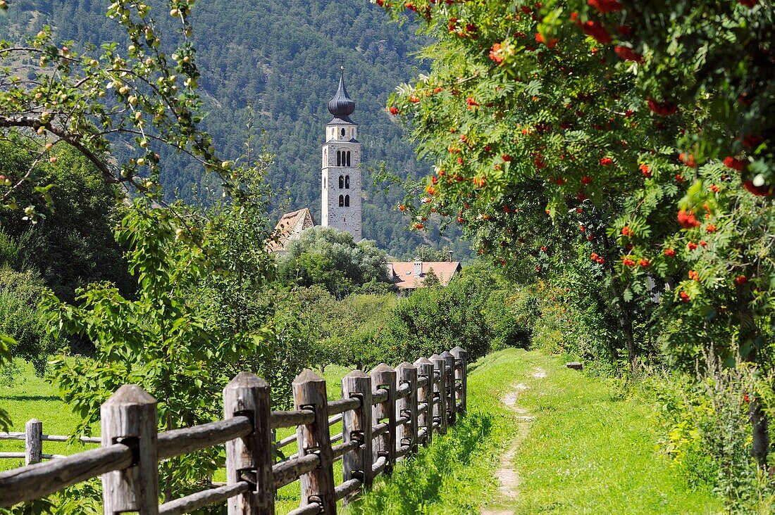 Riverside path to the church of San Pancrazio beside the Mediaeval walled town of Glurns, Glorenza Val Venosta, Italian Alps