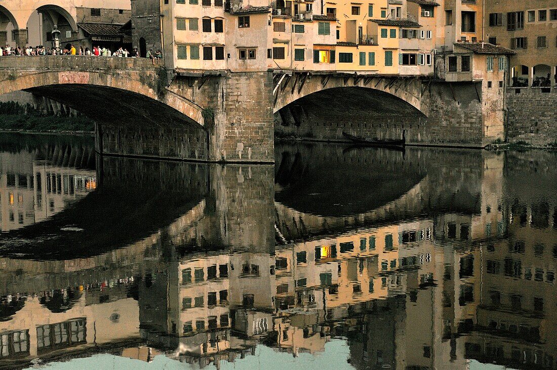 Florence, Tuscany, Italy The Ponte Vecchio old bridge across the River Arno in the heart of the mediaeval renaissance city