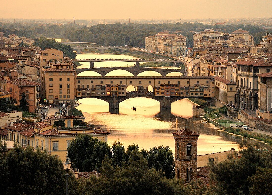 Florence, Tuscany, Italy Classic view of the Ponte Vecchio and the River Arno from the Piazzale Michelangelo Summer evening