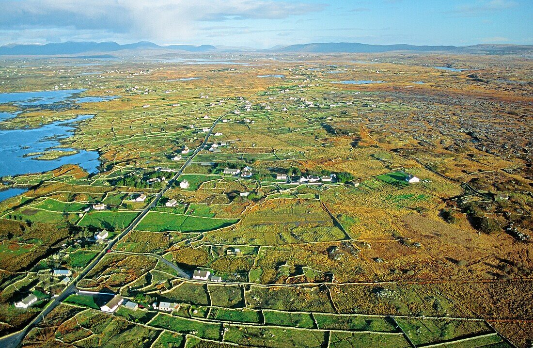 Typical Connemara landscape of rocky terrain, small marginal farms, tidal inlets and small lakes County Galway, west Ireland