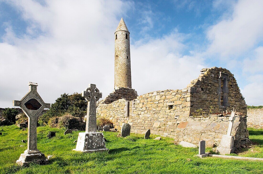The early Celtic Christian Round Tower and church at Rattoo, south of Ballybunnion, County Kerry, Ireland Rises to 92 feet