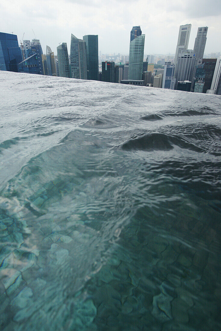 View of the Central Business District from Sands SkyPark Infinity Pool, Marina Bay Sands Hotel, Singapore, Asia