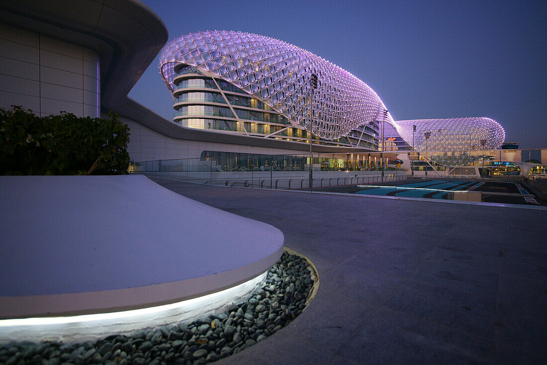 The Yas Hotel, a hotel facility built across the F1 Yas Marina Circuit, Yas Island, Abu Dhabi, United Arab Emirates, UAE