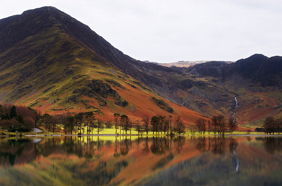 Lake Buttermere with reflections in autumn, Lake District National Park, Cumbria, UK - England