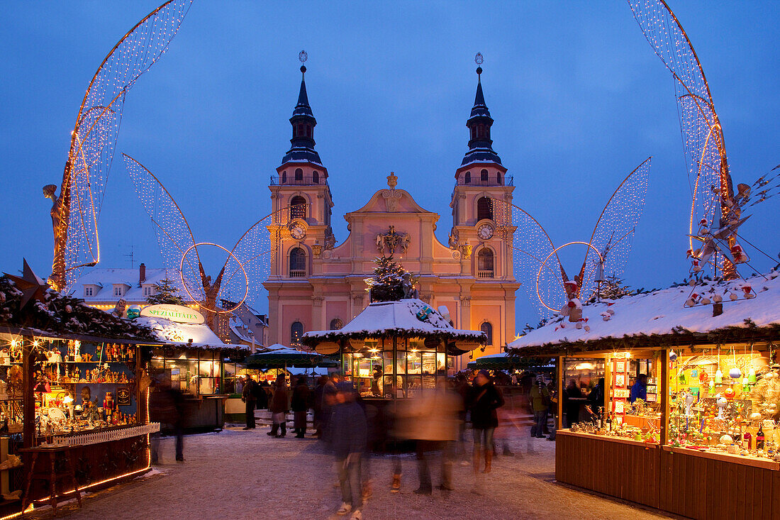 Christmas Market and church at dusk, Ludwigsburg, Baden Wurttemberg, Germany