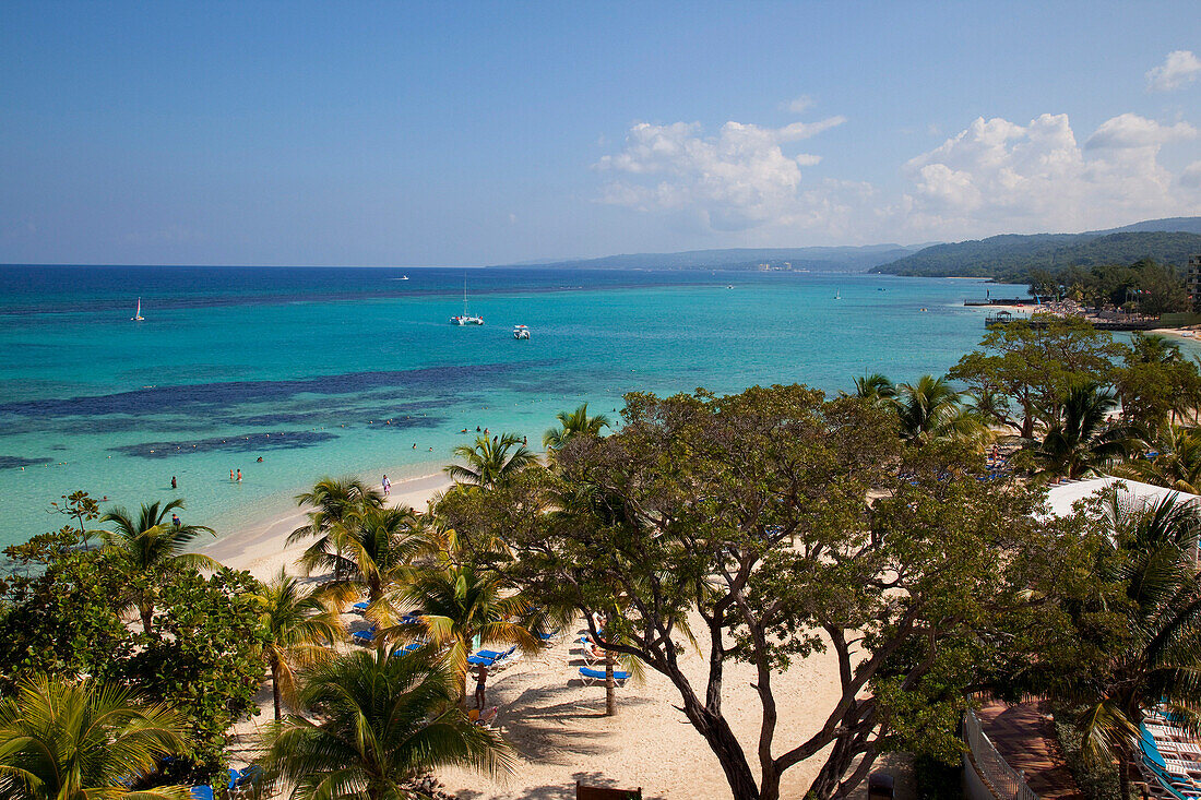 View of St Anns Bay over trees, Ocho Rios, Jamaica, Caribbean